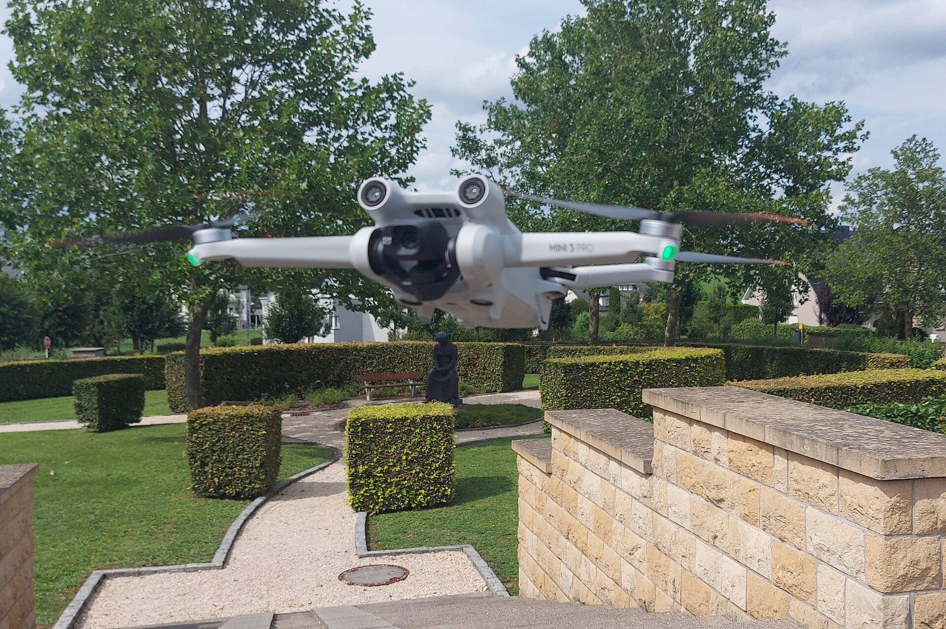 The DJI Mini 3 Pro drone in flight