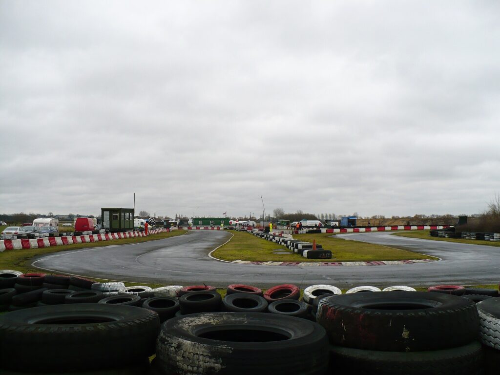 A single corner of a kart circuit seen whole from above