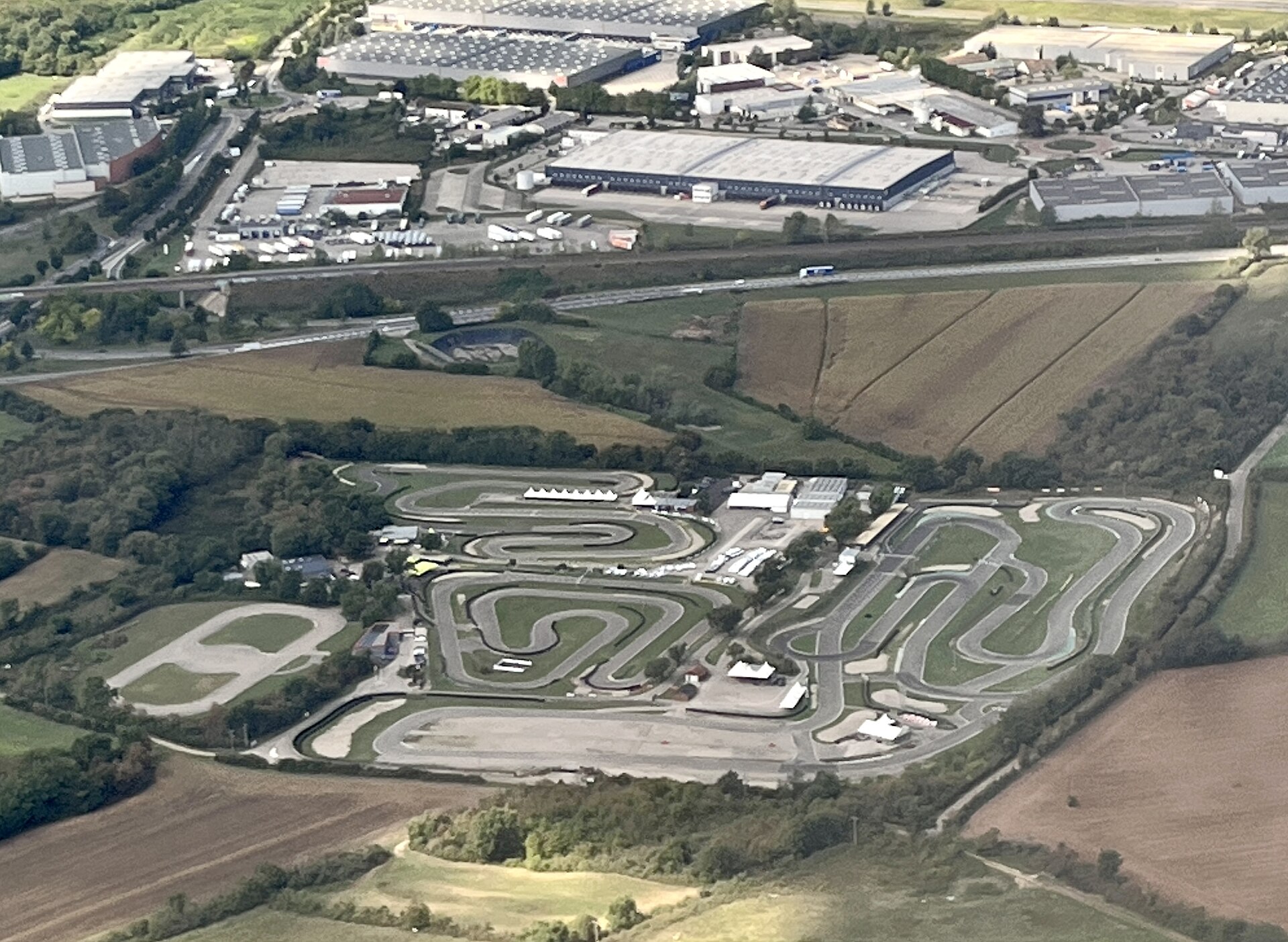 Aerial view of a go-kart circuit photographed from an airliner