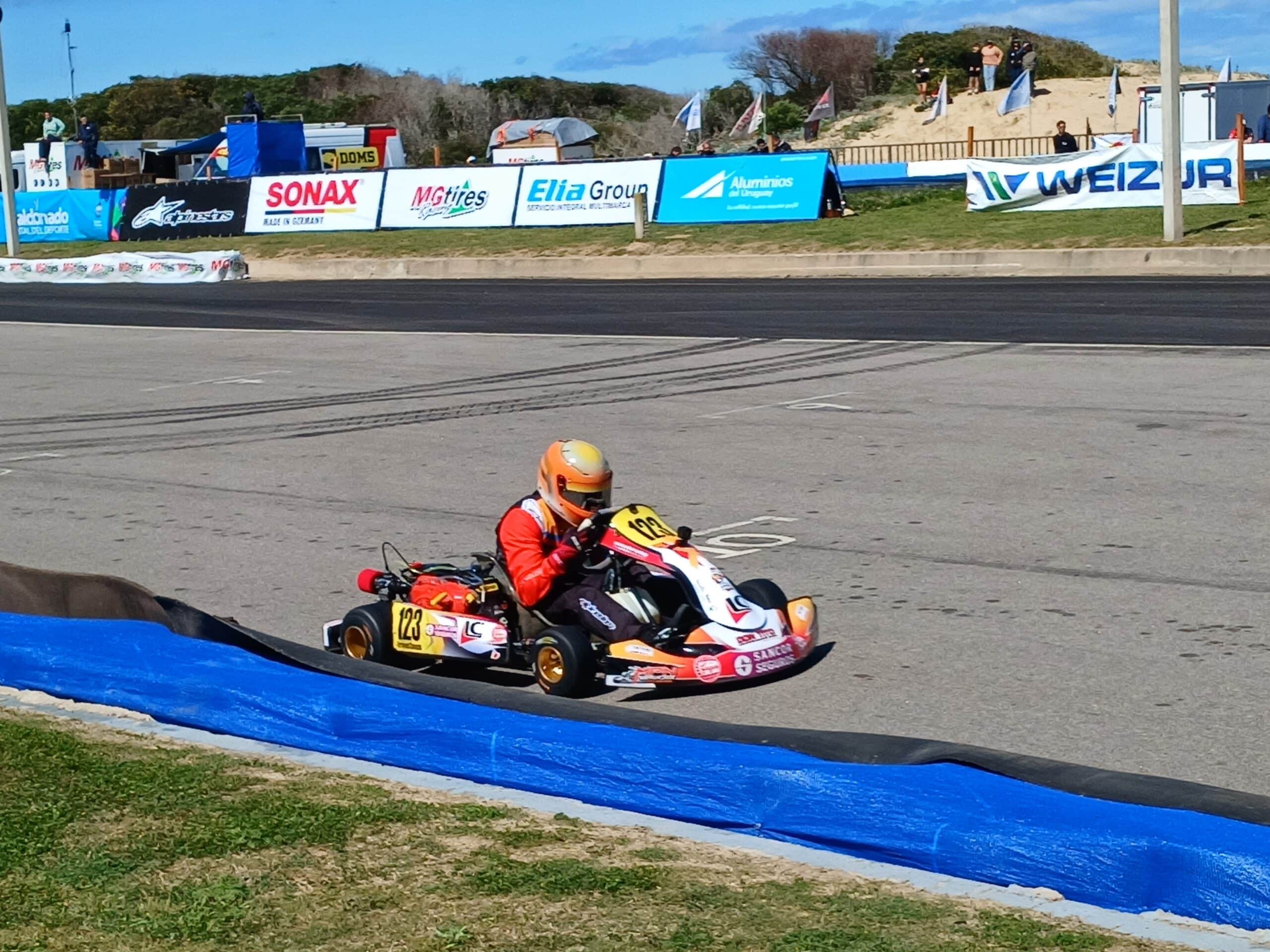Kart taking a single corner on track, chassis loaded mid-corner