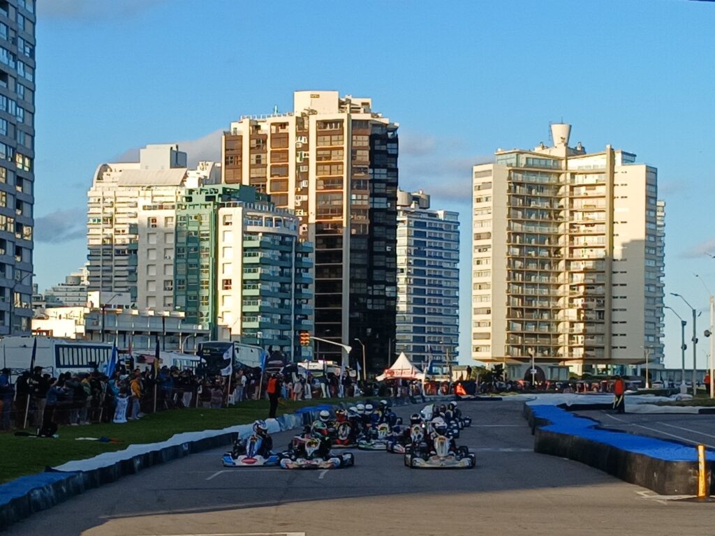 Karts lined up in pairs on a formation lap