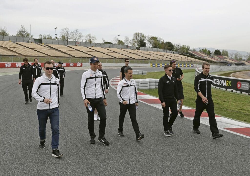 Racing drivers walking the Circuit de Barcelona-Catalunya on foot during a pre-event track walk
