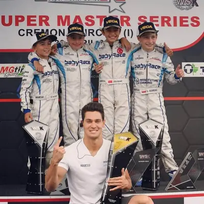 Alessio Lorandi celebrating a win with his BabyRace drivers
