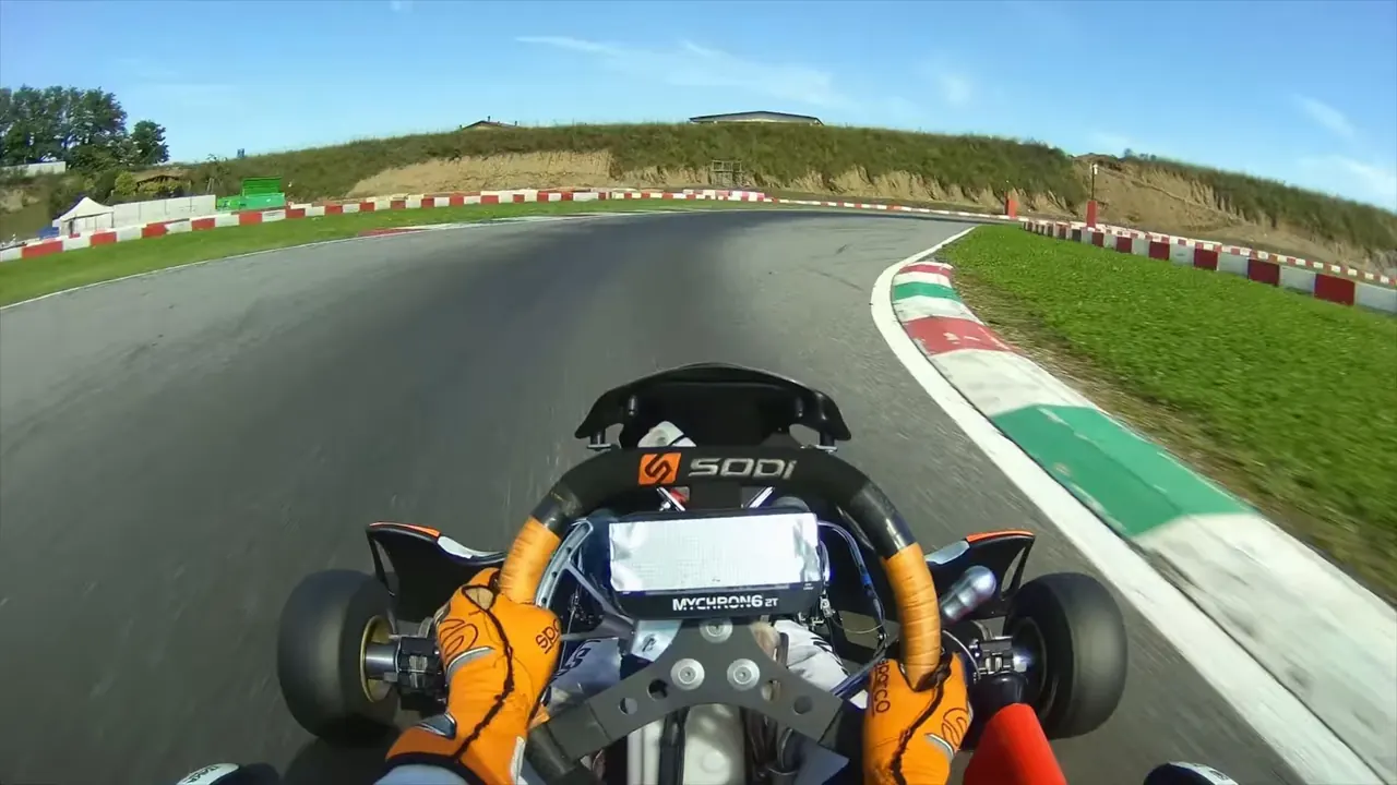 Onboard view of a shifter kart on the apex kerb at Franciacorta, with Alessio's annotations